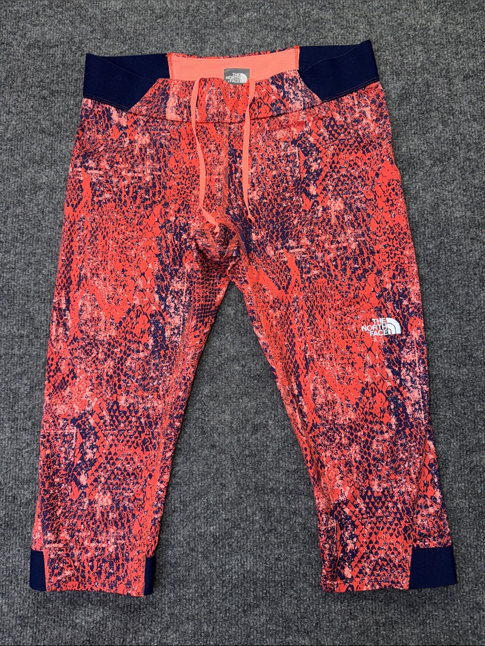 The North Face Motus Coral and Navy Patterned Capri Leggings